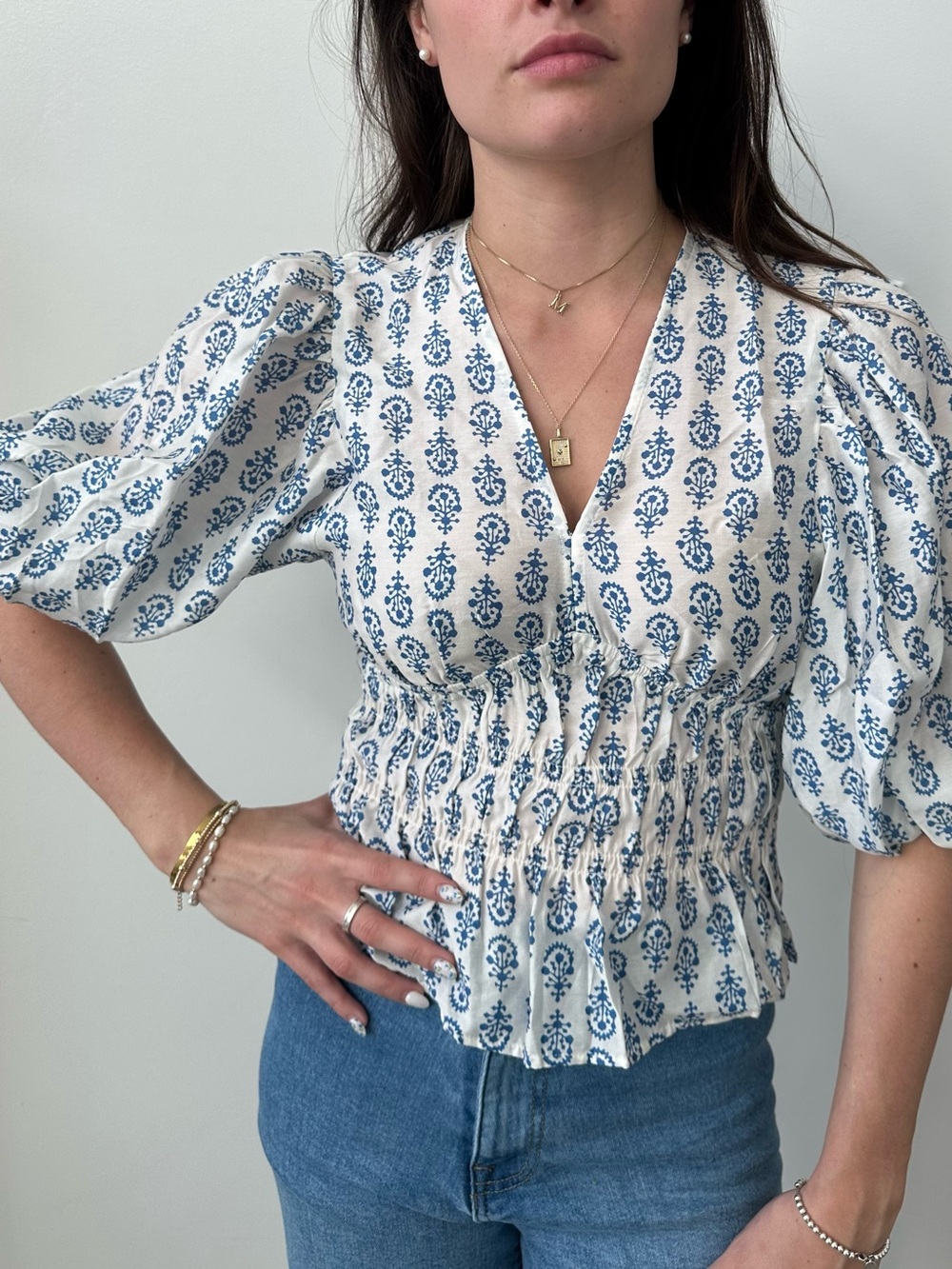 H&M White Blouse with Blue Floral Print and Smocked Waist